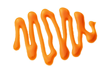 Liquid caramel on white background