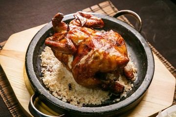 Roasted Chicken on crust of overcooked rice