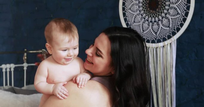 Mom with a child on the chair