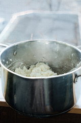 Steam is going out of the kitchen pot