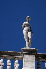 Statue at the top of National Library of St Mark`s Biblioteca Marciana, Venice, Italy, UNESCO World Heritage Sites
