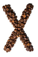 Roasted coffee bean letter X isolated on white