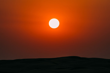Sun in the sky over the desert
