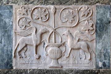 Byzantine relief of two griffins, facade detail of St. Mark's Basilica, St. Mark's Square, Venice, Italy, UNESCO World Heritage Sites