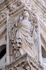 Fototapeta premium Archangel Gabriel, detail of the Doge Palace, St. Mark Square, Venice, Italy, UNESCO World Heritage Sites 