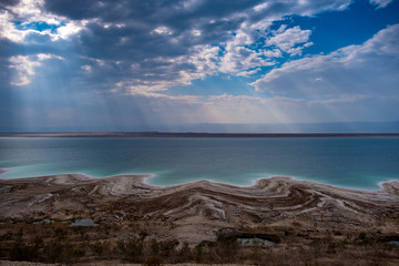 Fototapeta na wymiar Beautiful green white salty coastline of Dead sea in Jordan