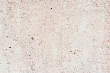Wall fragment with scratches and cracks