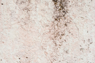 Wall fragment with scratches and cracks