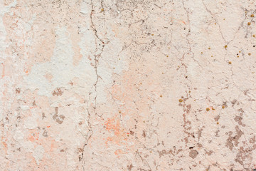 Wall fragment with scratches and cracks