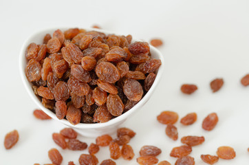 Raisins isolated on white background,top view.