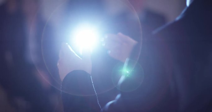 4K Closeup view from behind of unrecognizable speaker at a business conference. Slow motion.