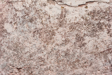 Wall fragment with scratches and cracks