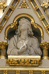 Fototapeta na wymiar Saint John the Evangelist, statue on the main altar in Zagreb cathedral 