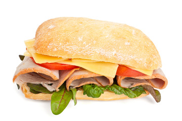 Ciabatta bread sandwich stuffed with meat, cheese and vegetables