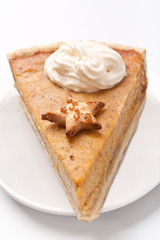 slice of Pumpkin pie with whipped cream