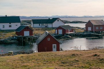 Fototapeta na wymiar Traditional buildings of a fishing village on the Norwegian coast.