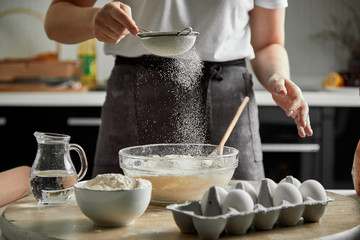 woman preparing food in kitchen