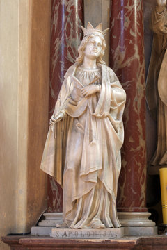 Saint Apollonia, statue on the altar of Saint Valentine in Church of Assumption of Virgin Mary in Zakanje, Croatia 