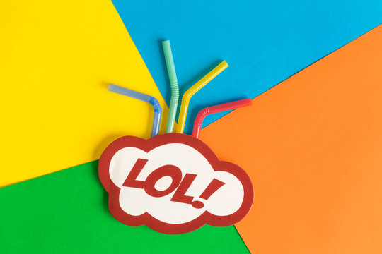 Lol in pop art style and drinking straws on colorful background minimal drink creative concept. - Powered by Adobe