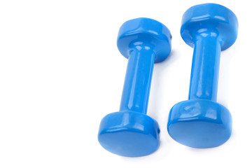 Pair of blue dumbbells isolated on a white background. Free space for text.