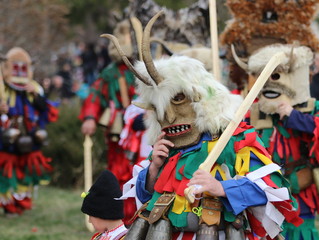 Zemen, Bulgaria - March 16, 2019: Masquerade festival Surva in Zemen, Bulgaria. People with mask called Kukeri dance and perform to scare the evil spirits.