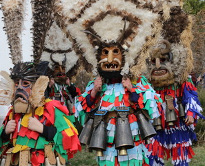 Obraz premium Zemen, Bulgaria - March 16, 2019: Masquerade festival Surva in Zemen, Bulgaria. People with mask called Kukeri dance and perform to scare the evil spirits.
