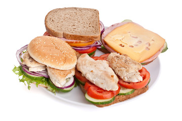 group of different tasty  sandwiches on a plate