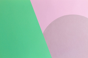 Abstract color paper background. Pastel pink and light green color round circle shape geometry composition. Top view