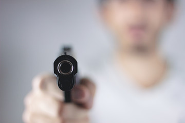 Robber With Gun Threatening Someone To