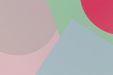 Abstract geometry color paper background with pastel pink, blue, green and red colors