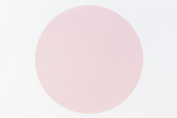 Abstract minimal color paper background. Pastel pink round circle on white background. Top view, flat lay
