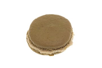 Delicious big french green macaron isolated over white background