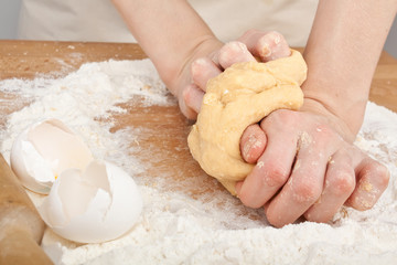 kneading the dough for homemade egg pasta