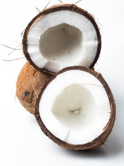 Ripe coconuts on white background