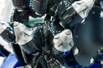 Powerful drilling tool. Screw drill, equipped with carbide-tipped elements and teeth