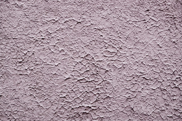 beige painted relief wall. background, texture.