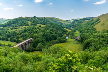 Peak District landscape with the Headstone Viaduct over the River Wye in the East Midlands,...