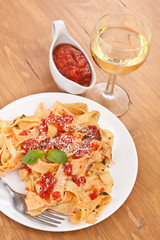 tasty pasta with tomato sauce and parmesan