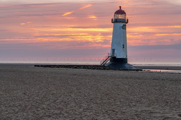 Sunset at the Point of Ayr Lighthouse near Talacre, Flintshire, Clwyd, Wales, UK