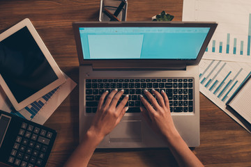 Cropped top above high angle view of feminine hands typing e-mail partner human journalism part...