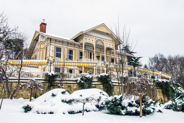 Istanbul, Turkey, 26 January 2010: Yellow pavilion and snow, Emirgan