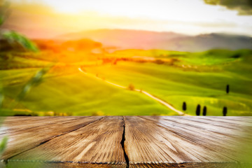 Desk of free space for your decoration and spring landscape of tuscany 