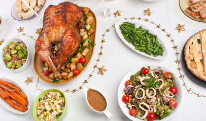 Christmas Dinner Table with stuffed roasted Turkey