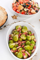 Bowl of Roasted Brussels  Sprouts with Bacon on a Christmas Dinner Table