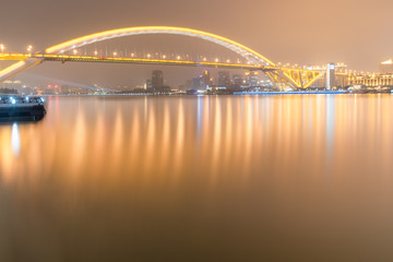 Night view of Lupu Bridge on Huangpu River, Shanghai city