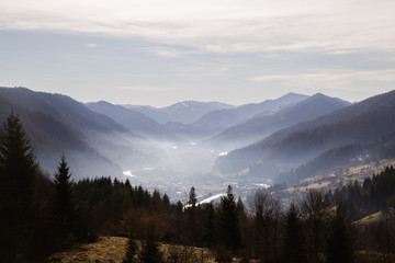 Obraz premium Landscape in the Hutsul mountain village in the morning .