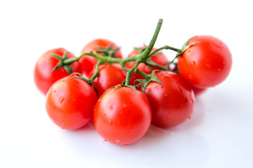 fresh tomatoes on white background