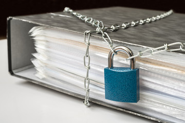 Files locked with chain and padlock - data and privacy security