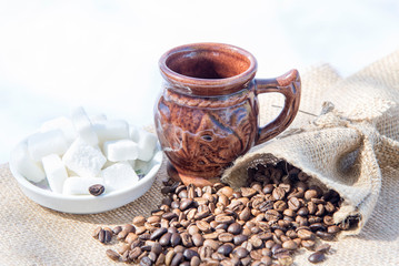 Brown cups for coffee and coffee beans decoration
