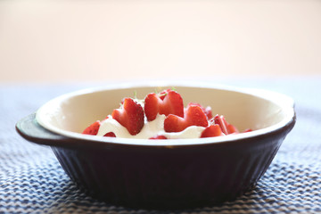 Strawberry with cream on table dessert